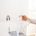 On-The-Go Drying Rack and Brush Set, Includes Travel Case and Bottle Brush for Compact Storage, Holds up to 8 Bottles, Baby Travel Accessories, Gray